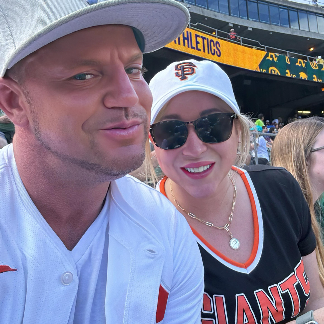 Couple at a baseball game