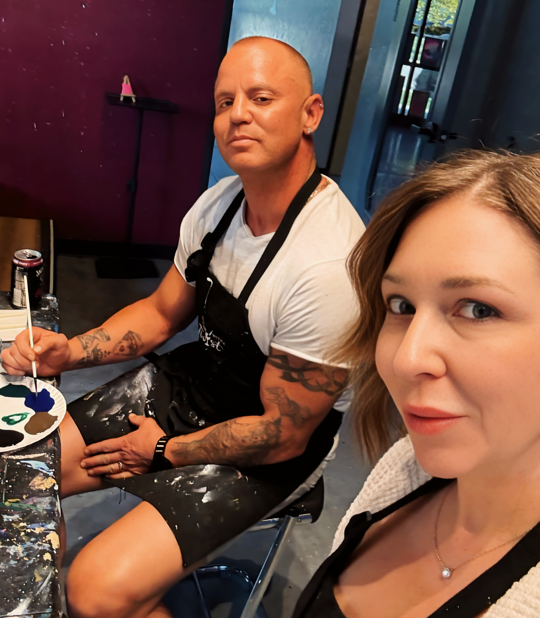 Couple painting together